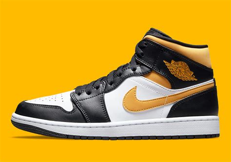 black and gold jordan 1 mids|air jordan 1 university gold.